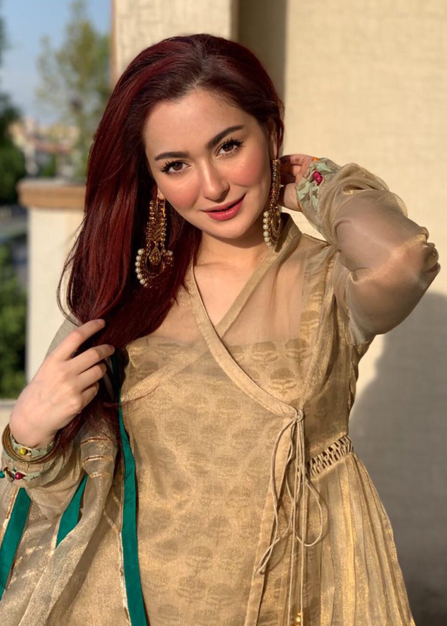 hania amir orange dress Hania Aamir